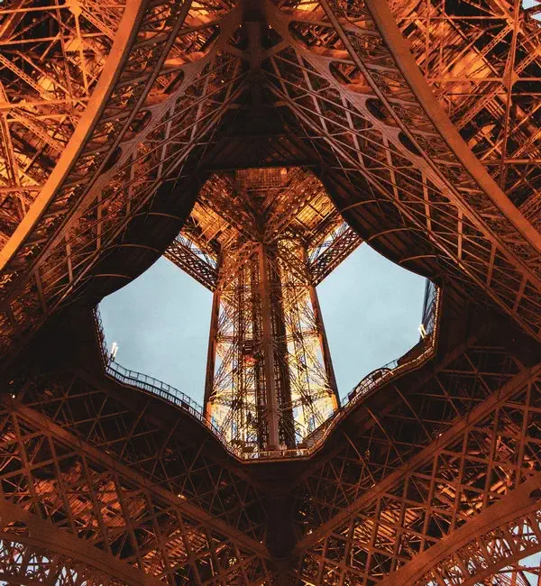 Close-up to the illuminated structure of the Eiffel Tower